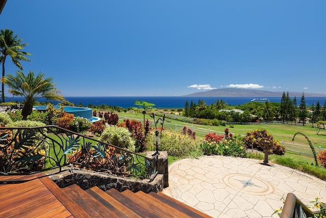 view of patio featuring a water view