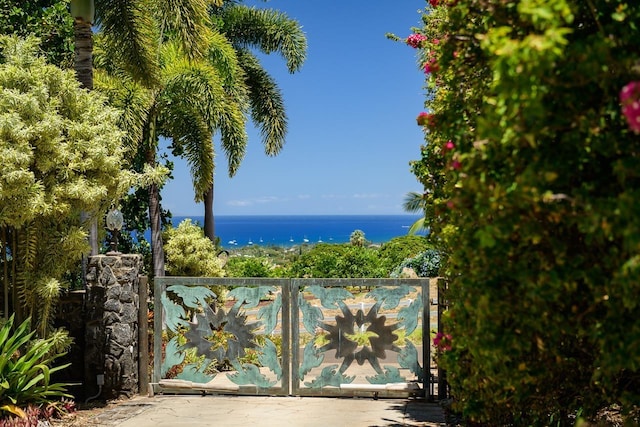 view of gate featuring a water view