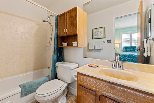 full bathroom featuring vanity, toilet, and shower / bath combo with shower curtain