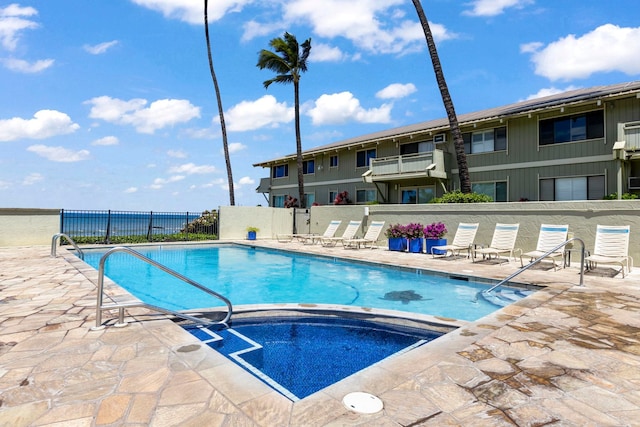 view of pool featuring a patio