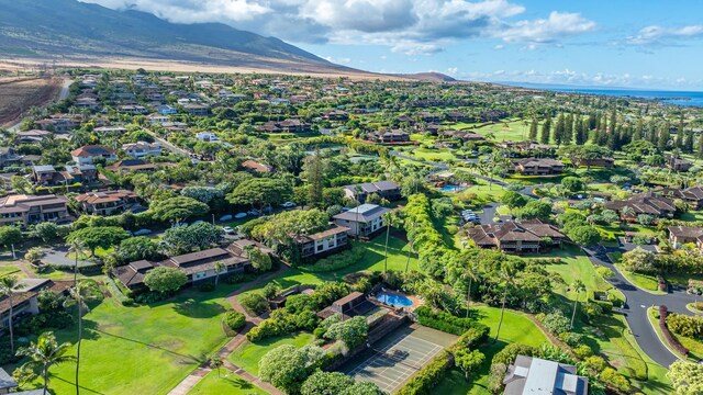 drone / aerial view featuring a mountain view