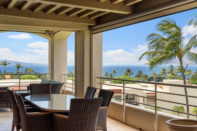 balcony featuring a water view