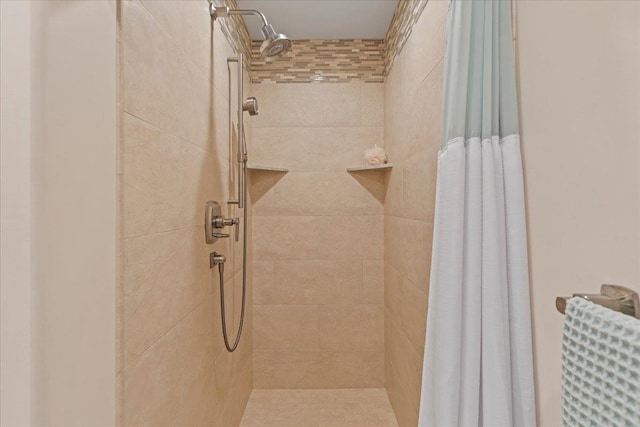 bathroom with a shower with curtain