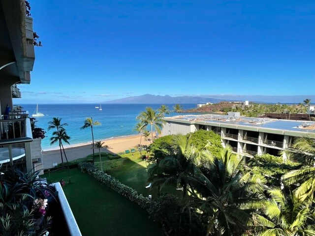 property view of water with a view of the beach and a mountain view