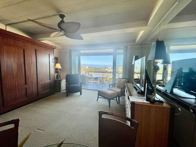 living room with light carpet and ceiling fan