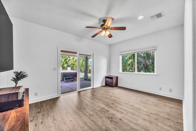 207 Kahana Ridge Dr Unit 132, Lahaina, HI 96761 - unfurnished room featuring wood finished floors, a ceiling fan, and baseboards