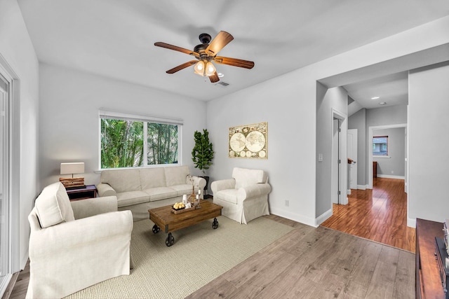 207 Kahana Ridge Dr Unit 132, Lahaina, HI 96761 - living area featuring wood finished floors, a ceiling fan, and baseboards
