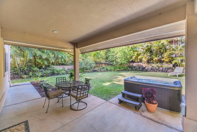 207 Kahana Ridge Dr Unit 132, Lahaina, HI 96761 - view of patio / terrace with a hot tub and outdoor dining space