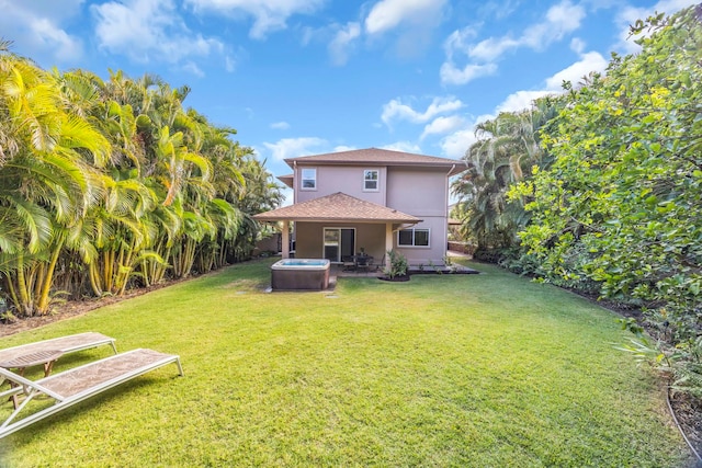 207 Kahana Ridge Dr Unit 132, Lahaina, HI 96761 - view of green lawn featuring a hot tub and a patio area