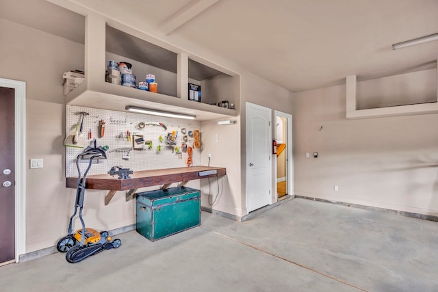 207 Kahana Ridge Dr Unit 132, Lahaina, HI 96761 - garage with a workshop area and baseboards