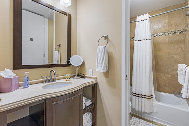 bathroom with vanity and shower / bath combo with shower curtain