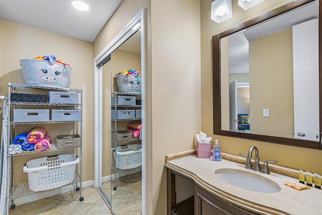 bathroom featuring vanity and tile patterned floors