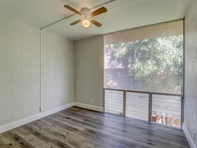 3676 Lower Honoapiilani Rd Unit F303, Lahaina, HI 96761 - empty room with ceiling fan and dark hardwood / wood-style flooring