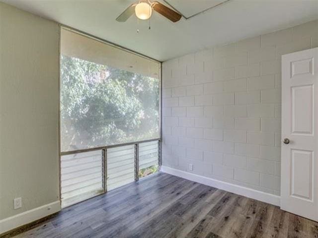 3676 Lower Honoapiilani Rd Unit F303, Lahaina, HI 96761 - spare room featuring ceiling fan and hardwood / wood-style flooring