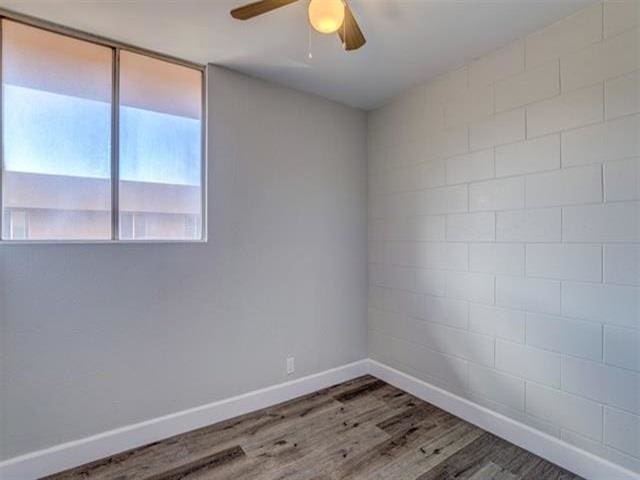 3676 Lower Honoapiilani Rd Unit F303, Lahaina, HI 96761 - unfurnished room featuring wood-type flooring and ceiling fan