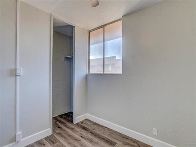 3676 Lower Honoapiilani Rd Unit F303, Lahaina, HI 96761 - unfurnished bedroom with a closet and hardwood / wood-style floors