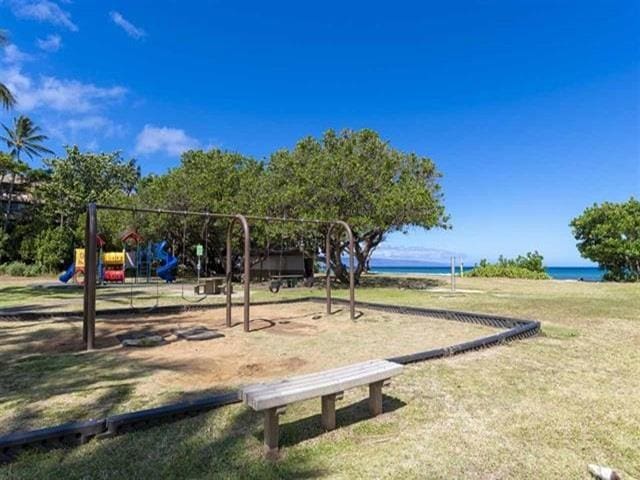 3676 Lower Honoapiilani Rd Unit F303, Lahaina, HI 96761 - view of play area featuring a yard and a water view
