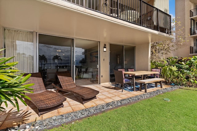 view of patio / terrace with a balcony