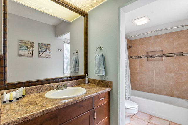 full bathroom with vanity, tile patterned floors, toilet, and shower / tub combo with curtain