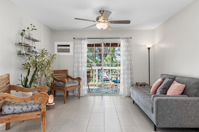 living area with tile patterned flooring and ceiling fan