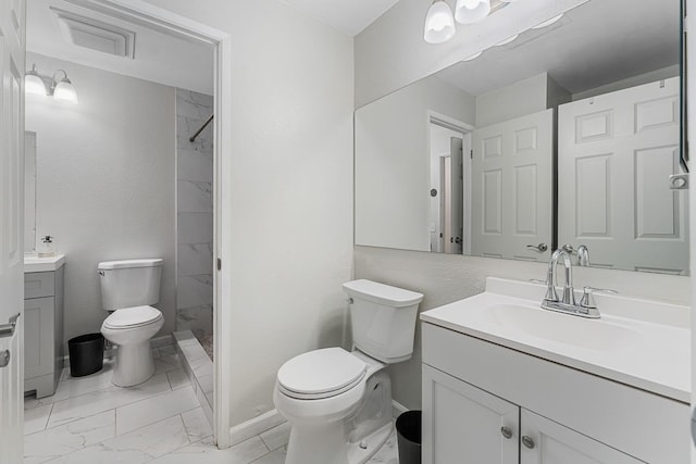 full bathroom with a shower, marble finish floor, toilet, and vanity