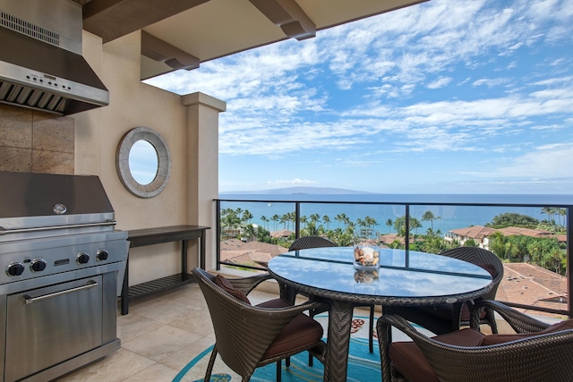 balcony with a grill and a water view