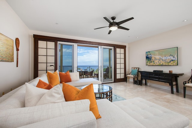 living room featuring ceiling fan