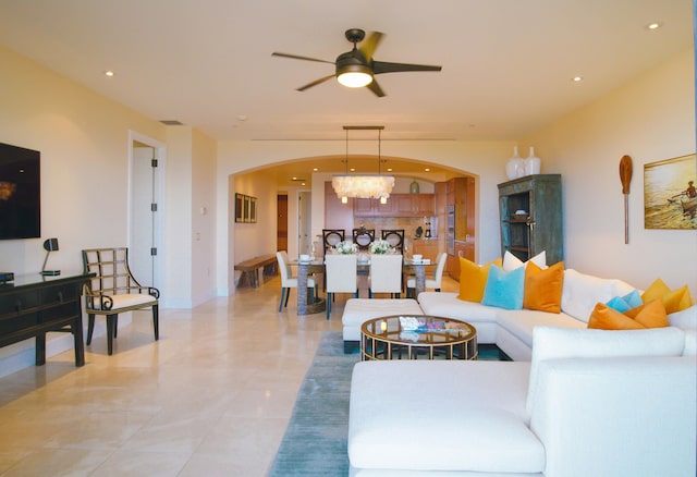 3800 Wailea Alanui Blvd Unit J505, Kihei, HI 96753 - living area with arched walkways, ceiling fan, a chandelier, and recessed lighting