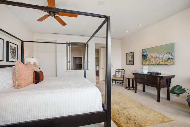 bedroom featuring light carpet and ceiling fan