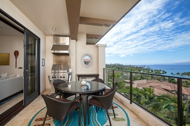 balcony featuring grilling area and a water view