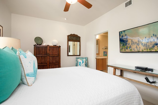 bedroom featuring ensuite bathroom and ceiling fan