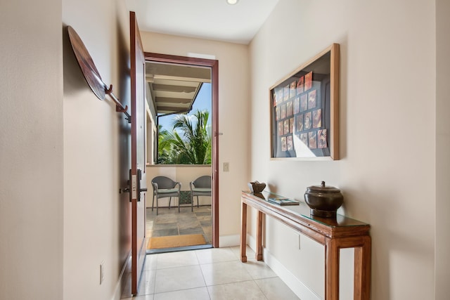 entryway featuring light tile patterned floors