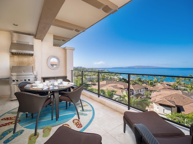 3800 Wailea Alanui Blvd Unit J505, Kihei, HI 96753 - balcony featuring a water view and outdoor dining space