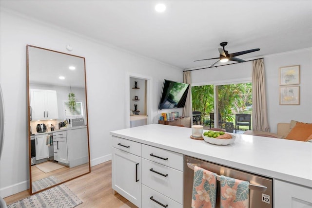 4435 Lower Honoapiilani Rd Unit 142, Lahaina, HI 96761 - kitchen with wine cooler, crown molding, a ceiling fan, white cabinetry, and light countertops