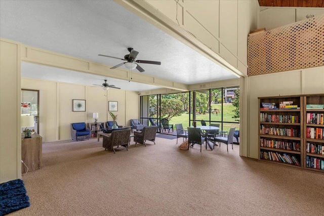 4435 Lower Honoapiilani Rd Unit 142, Lahaina, HI 96761 - living area featuring carpet flooring and a ceiling fan