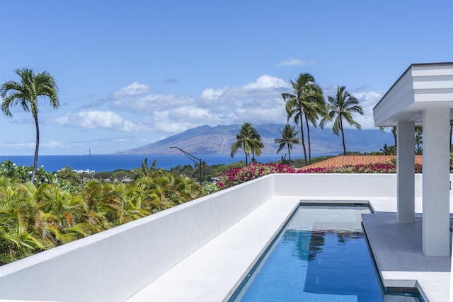 outdoor pool with a mountain view
