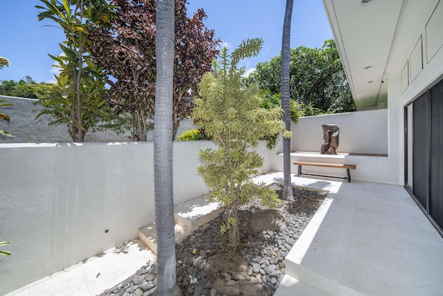 view of patio with fence