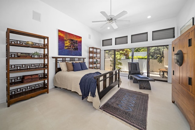 bedroom featuring recessed lighting and access to outside