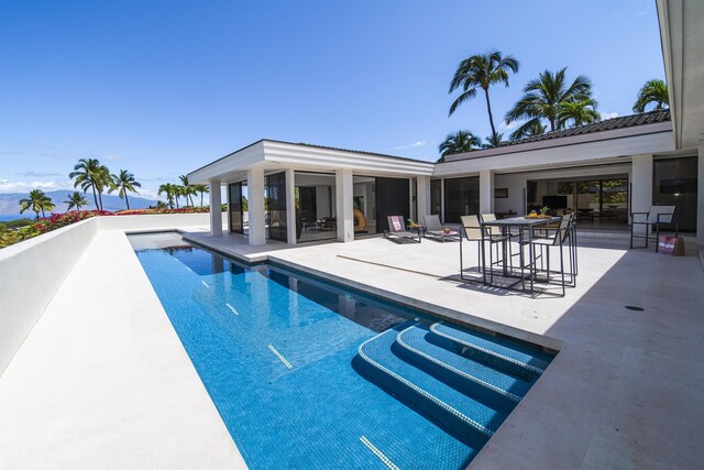 swimming pool with a patio