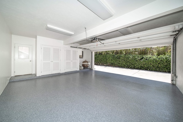 garage featuring a garage door opener