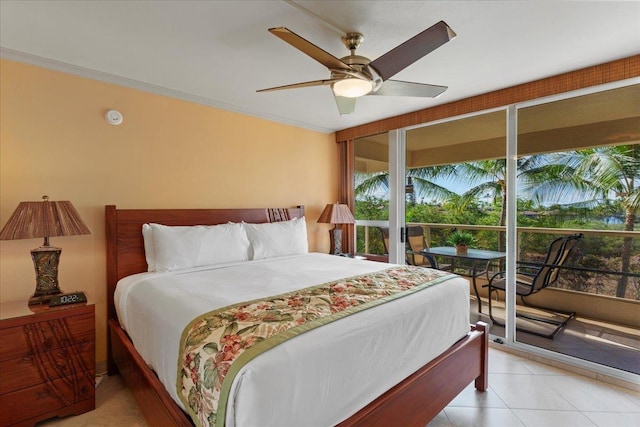 tiled bedroom with access to outside, ceiling fan, and ornamental molding