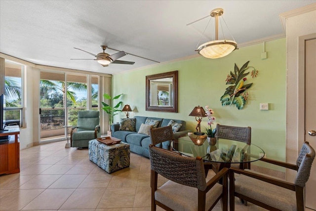 tiled living room with ceiling fan and ornamental molding