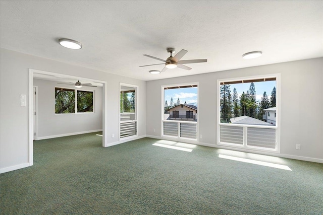 185 Hololani St, Pukalani, HI 96768 - unfurnished room with a ceiling fan, plenty of natural light, carpet floors, and a textured ceiling