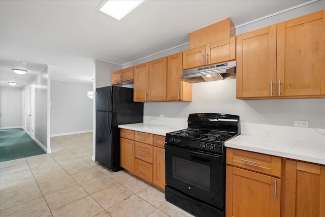 185 Hololani St, Pukalani, HI 96768 - kitchen featuring under cabinet range hood, black appliances, light tile patterned floors, and baseboards