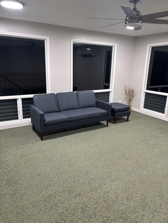 185 Hololani St, Pukalani, HI 96768 - carpeted living area featuring a ceiling fan, baseboards, and a wall mounted AC