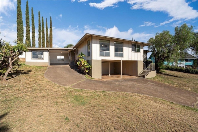 185 Hololani St, Pukalani, HI 96768 - back of house with driveway and a yard