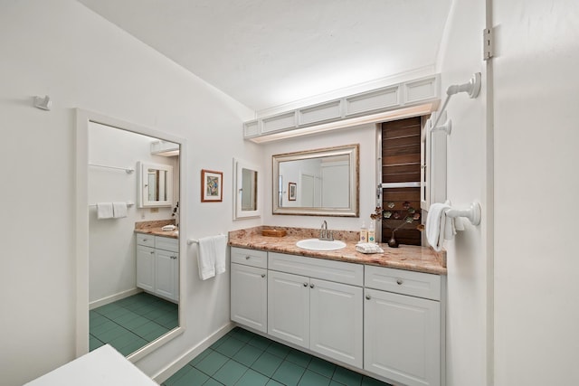 45 Kai Ala Dr Unit A615, Lahaina, HI 96761 - bathroom with tile patterned floors, vanity, and vaulted ceiling