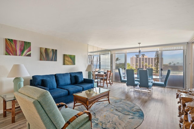 45 Kai Ala Dr Unit A615, Lahaina, HI 96761 - living area with wood finished floors and a wall of windows