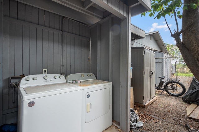 laundry area featuring separate washer and dryer and laundry area