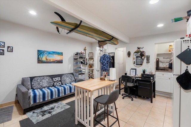 interior space featuring light tile patterned floors and recessed lighting